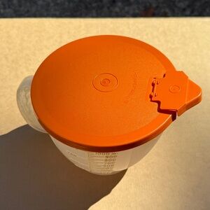 Vintage Tupperware Orange Lidded Measuring Cup